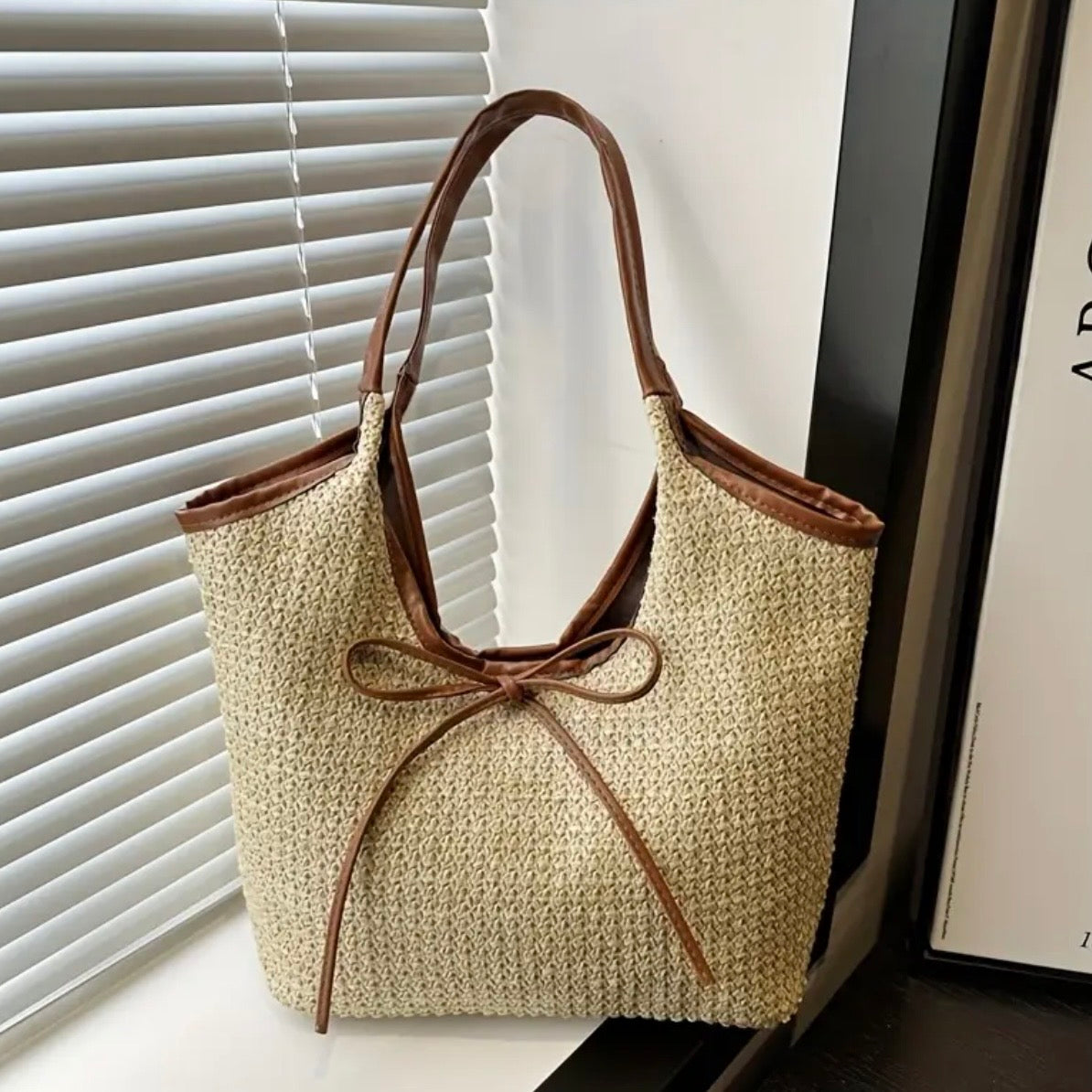 Elara Sandalwood Bow Bag.