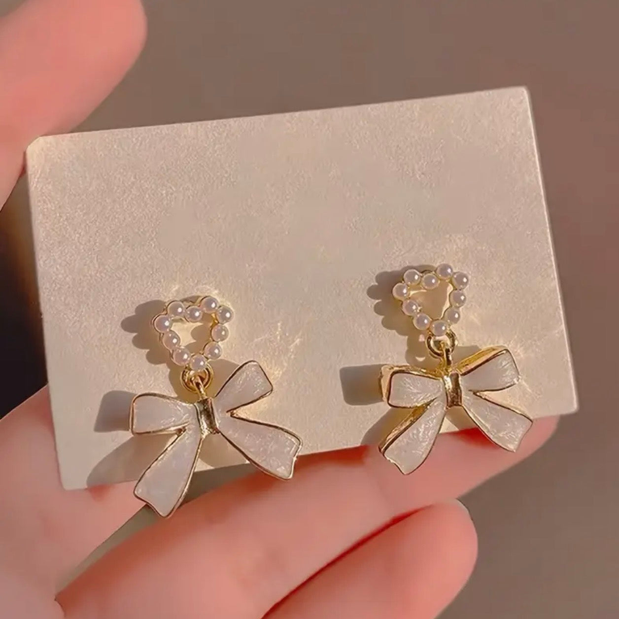 Charmed Heart Bow Earrings.