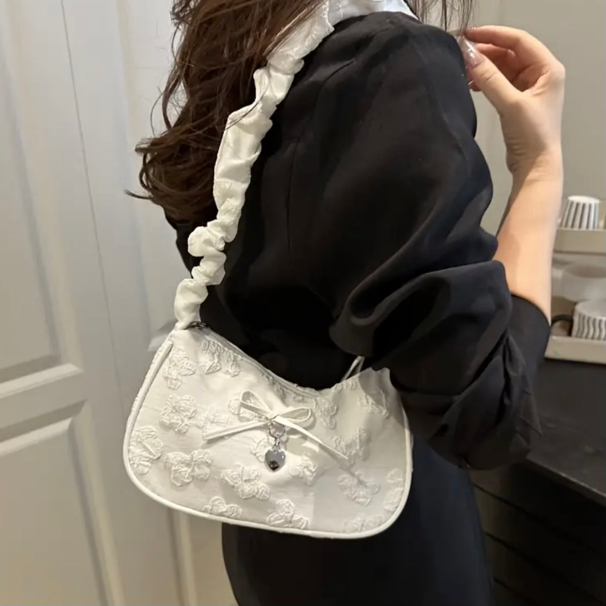 Cream Treasure Shoulder Bag.