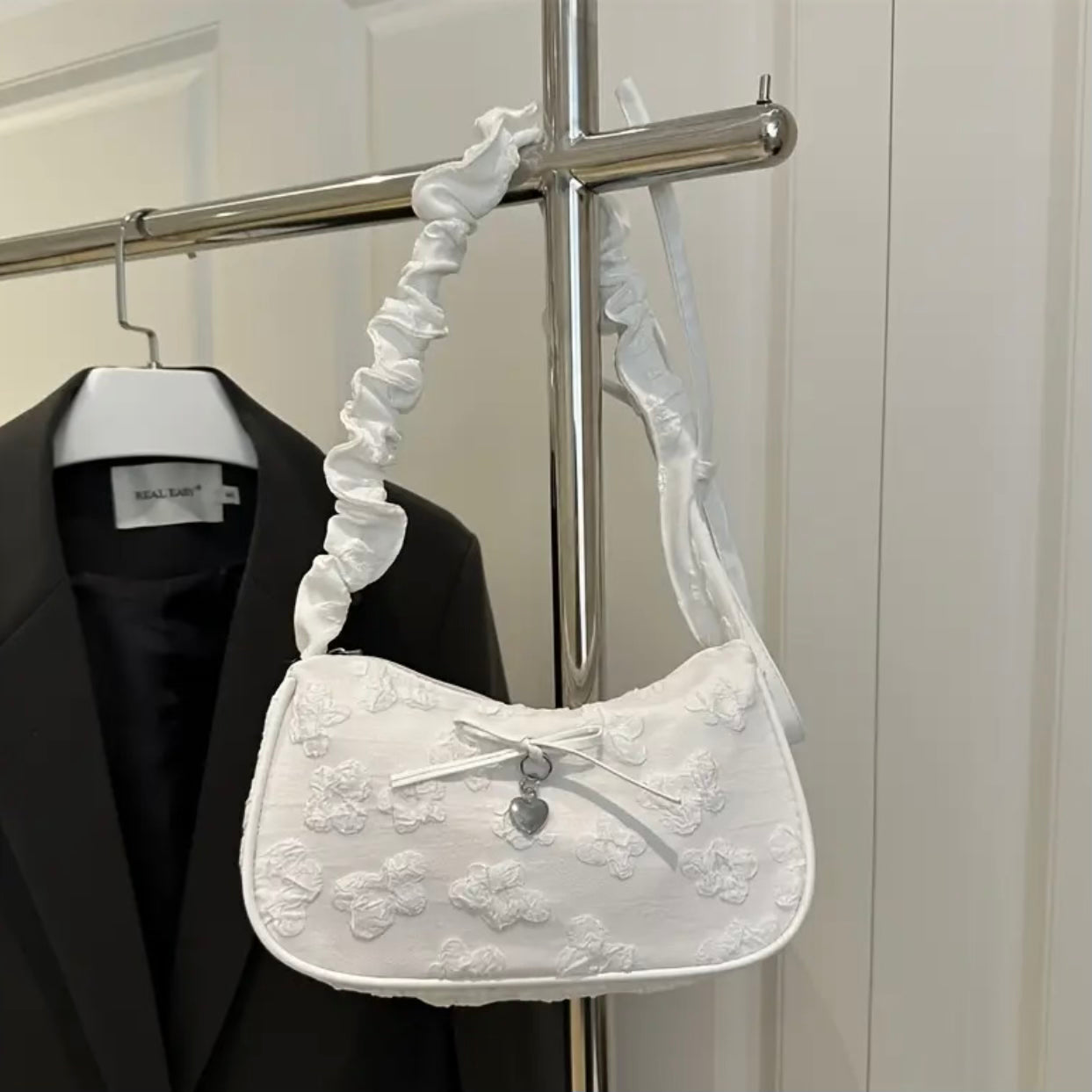 Cream Treasure Shoulder Bag.