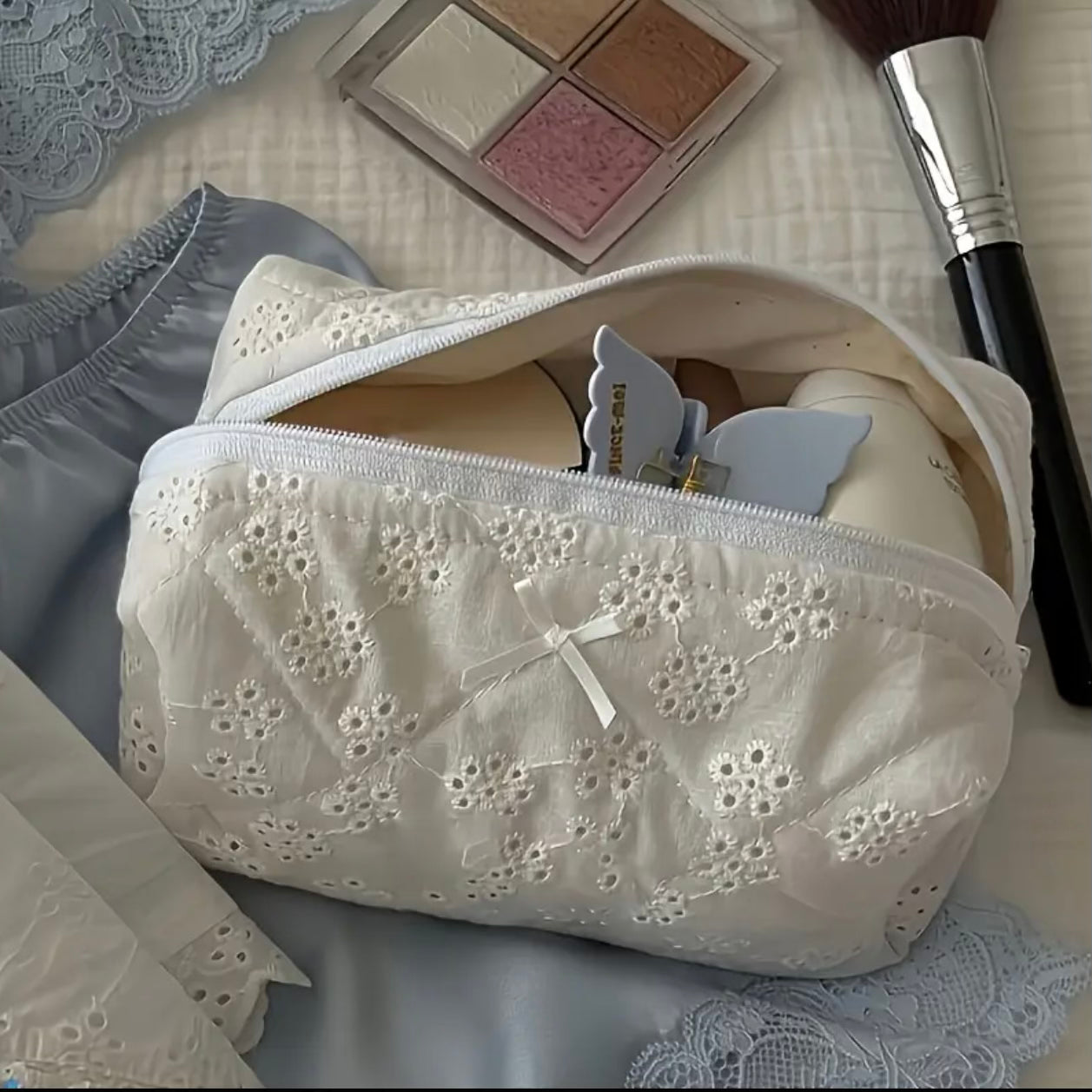 Snow Petal Cosmetic Bag.