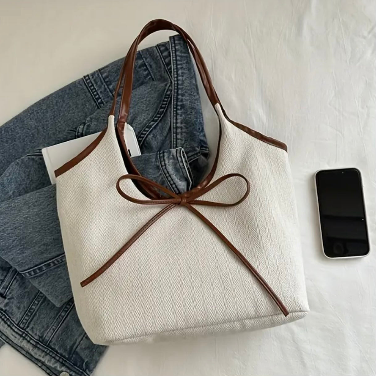 Amara Mocha Bow Bag.