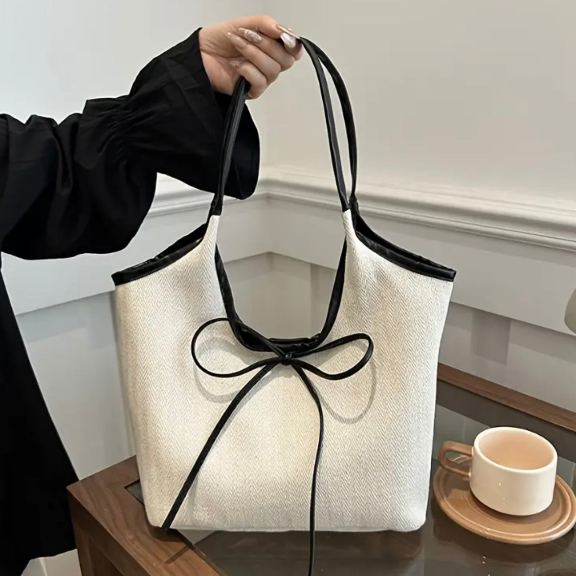 Amara Noir Bow Bag.