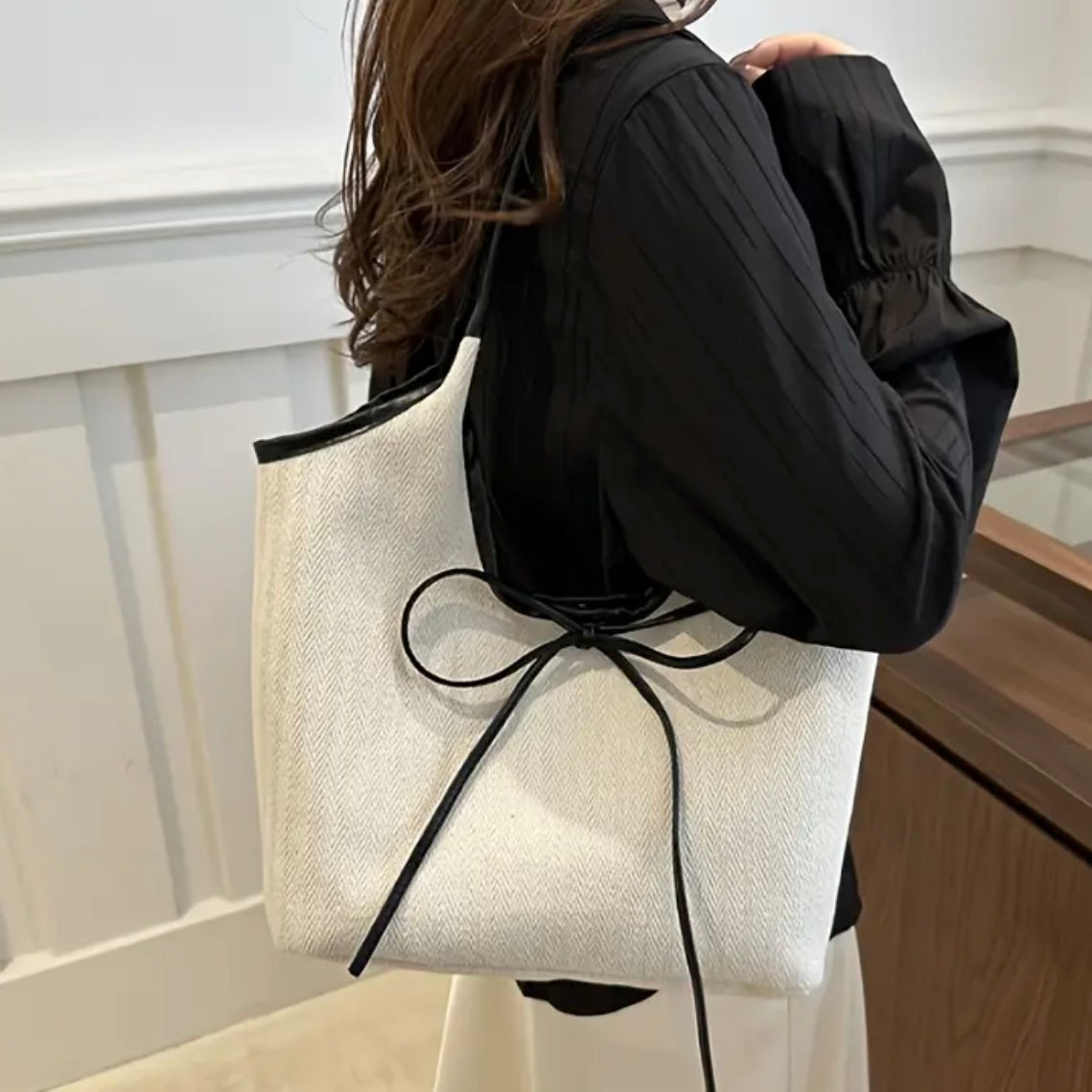 Amara Noir Bow Bag.