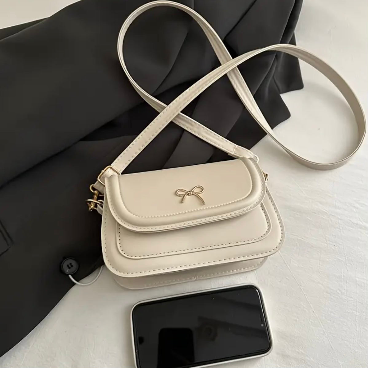 Celeste Blanc Crossbody Bag.